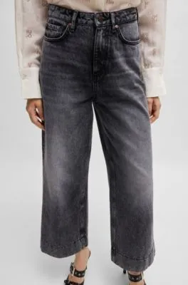 Jeans de pernera ancha en denim rígido negro